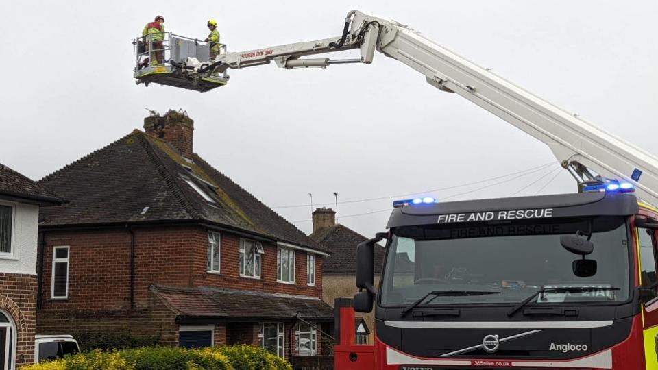 Oxford Mail: Oxfordshire Fire and Rescue Service crews in Wallingford after home was hit by lightning.