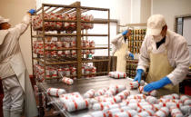 Workers work in salami production section in Akova Impex Meat Industry Ovako, which makes halal quality certified products, in Sarajevo, Bosnia and Herzegovina, December 2, 2016. REUTERS/Dado Ruvic