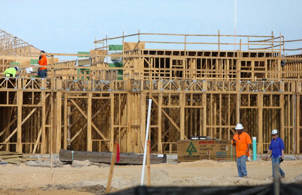 Construction crews continue work on several apartment buildings being built off SW 17th Road and Tower Road near the attached to the Grand Oaks Subdivision in 2021.