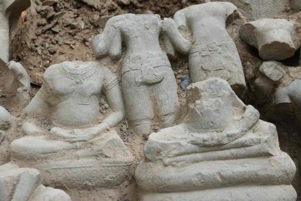 A close-up photo shows some of the statues. Photo from Phouk Chea / Yi Sotha via APSARA National Authority
