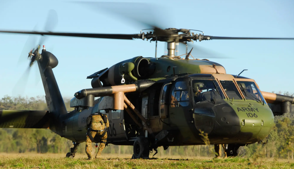 An Australian Army S-70A-9 Black Hawk preparing to lift off at Shoalwater Bay Training Area during exercise Talisman Saber 07. <em>COMMONWEALTH OF AUSTRALIA, DEPARTMENT OF DEFENSE</em>