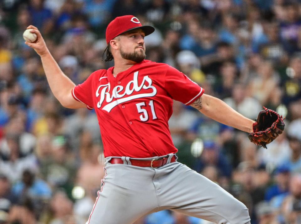 Aug 7, 2022; Milwaukee, Wisconsin, USA; Cincinnati Reds pitcher Graham Ashcraft (51) throws a pitch in the first inning against the Milwaukee Brewers at American Family Field. Mandatory Credit: Benny Sieu-USA TODAY Sports