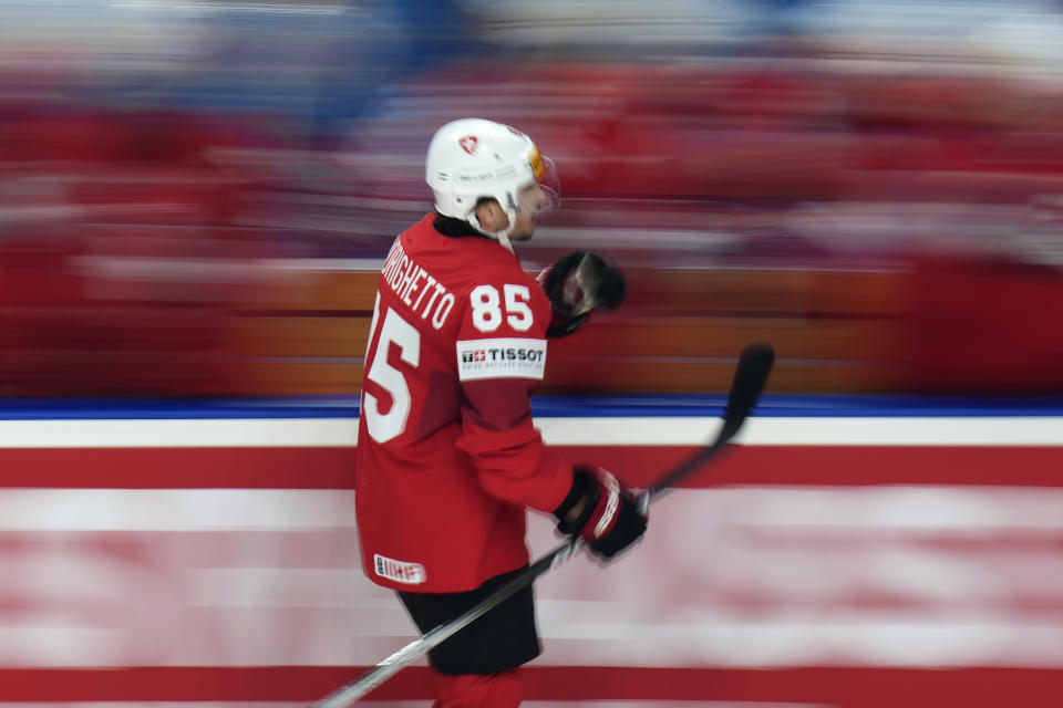 Switzerland's Sven Andrighetto celebrates after scoring his sides first goal during the preliminary round match between Switzerland and Norway at the Ice Hockey World Championships in Prague, Czech Republic, Friday, May 10, 2024. (AP Photo/Petr David Josek)