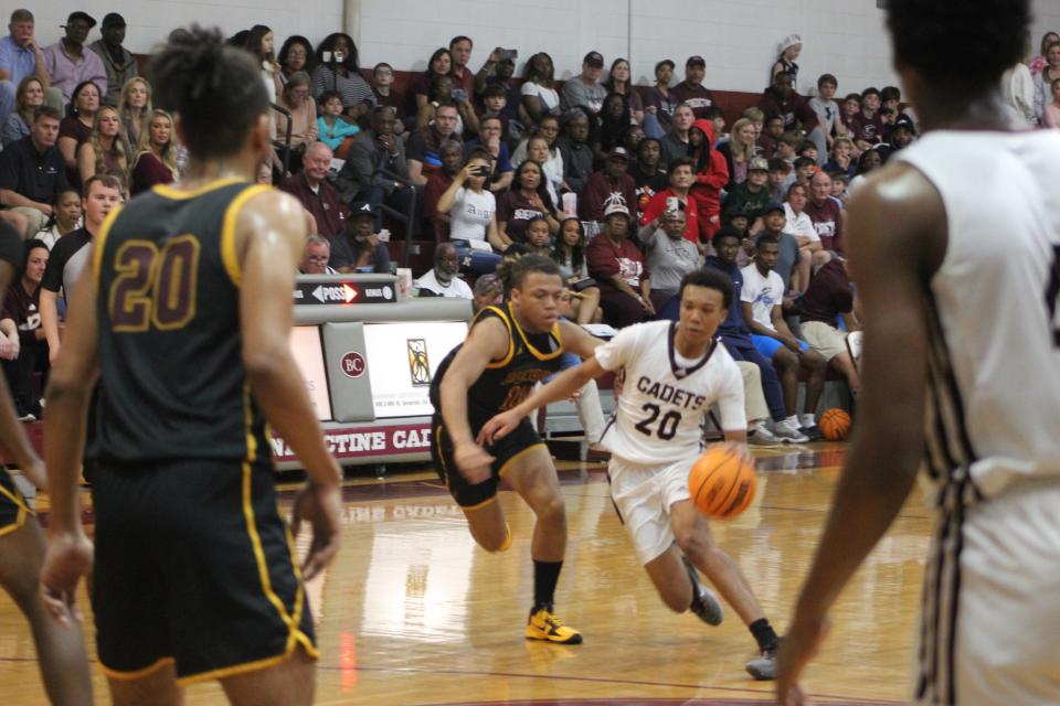 Caleb Jones of Benedictine scored 27 points in a playoff win over Perry Saturday.