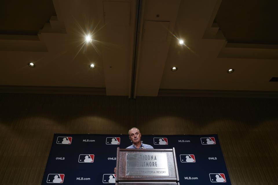 Major League Baseball Commissioner Robert Dean Manfred Jr. answers questions at spring training media day Wednesday, Feb. 15, 2023, in Phoenix. (AP Photo/Morry Gash)