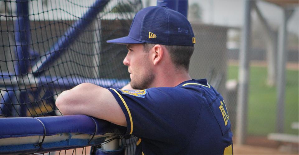 Brewers prospect Tyler Black watches batting practice Monday.