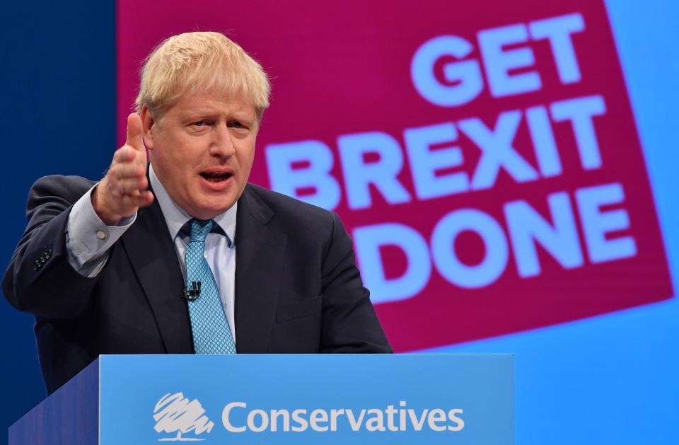 Britain's Prime Minister Boris Johnson delivers his keynote speech to delegates on the final day of the annual Conservative Party conference at the Manchester Central convention complex, in Manchester, north-west England on October 2, 2019. - Prime Minister Boris Johnson was set to unveil his plan for a new Brexit deal at his Conservative party conference Wednesday, warning the EU it is that or Britain leaves with no agreement this month. Downing Street said Johnson would give details of a "fair and reasonable compromise" in his closing address to the gathering in Manchester, and would table the plans in Brussels the same day. (Photo by Ben STANSALL / AFP) (Photo by BEN STANSALL/AFP via Getty Images)