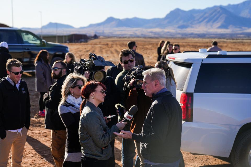 U.S. House Speaker Kevin McCarthy answers questions from reporters after a news conference in front of the U.S.-Mexico border south of Sierra Vista on Feb. 16, 2023, in Hereford.