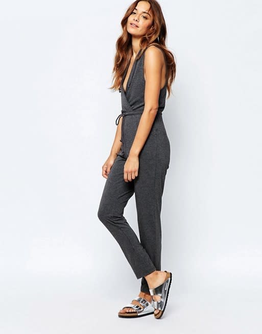 <p>Adult onesies may sound laughable but this item from Stitch & Pieces is far from being something to mock. The stylish one-piece is lightweight and features a flattering wrap V-neckline. Wear a turtleneck underneath for a layered look or toss a blazer over top for a looks that’s appropriate for a casual office environment. <i>Get it <a href="http://www.asos.com/stitch-pieces/stitch-pieces-wrap-front-jumpsuit/prd/5980030?iid=5980030&clr=Charcoal&SearchQuery=&cid=21867&pgesize=36&pge=4&totalstyles=532&gridsize=3&gridrow=12&gridcolumn=3" rel="nofollow noopener" target="_blank" data-ylk="slk:here;elm:context_link;itc:0;sec:content-canvas" class="link ">here</a>. </i></p>