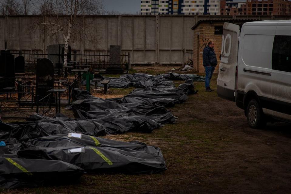 The line of body bags at the Bucha cemetery, waiting to be processed and buried.