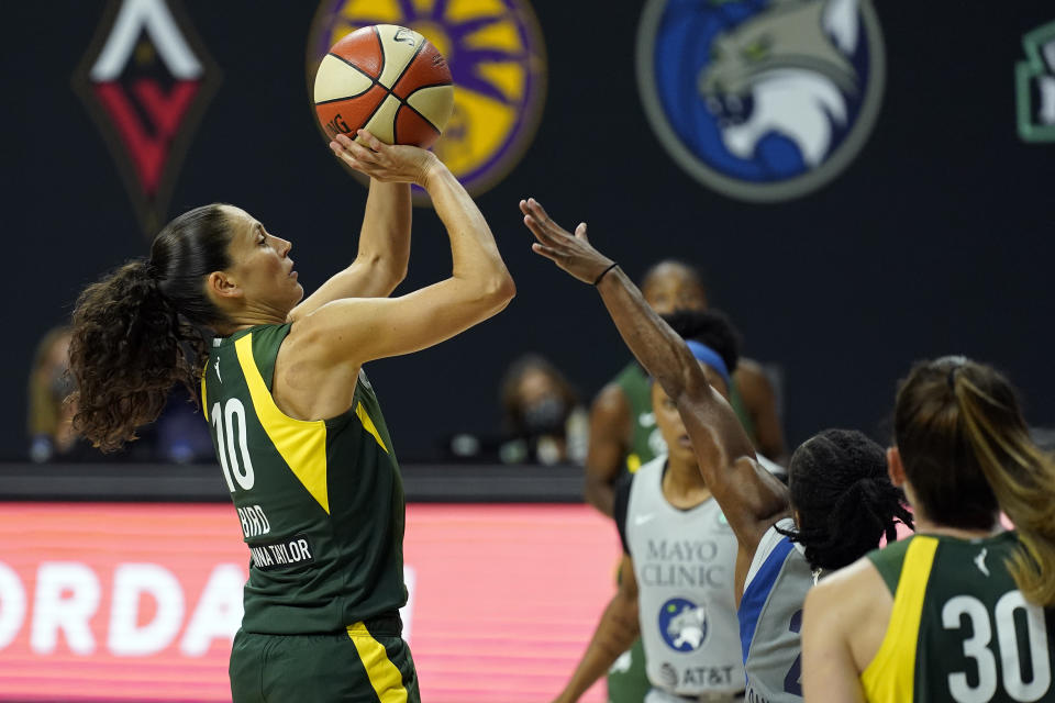 Seattle Storm guard Sue Bird (10) shoots over Minnesota Lynx guard Crystal Dangerfield (2) during the second half of Game 2 of a WNBA basketball semifinal round playoff series Thursday, Sept. 24, 2020, in Bradenton, Fla. (AP Photo/Chris O'Meara)