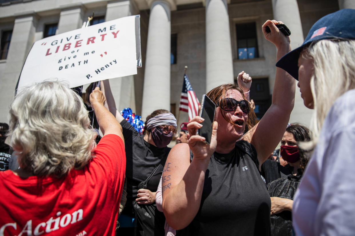 Black Lives Matter counter protester chants slogans during an 'Anti-Mask' rally, Black Lives Matter protest at Ohio Statehouse. (Megan Jelinger/SOPA Images/LightRocket via Getty Images)