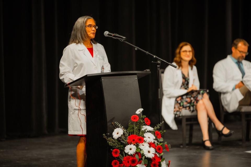 Lauren Cobbs, M.D., speaks at the White Coat Ceremony for the Texas Tech University Health Sciences Center Class of 2028, Friday at the Buddy Holly Hall of Performing Arts and Sciences.