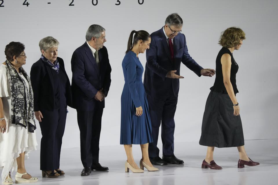 Ernestina Godoy, legal advisor, from left, Alicia Bárcena, secretary of environment and natural resources, Juan Ramón de la Fuente, foreign affairs secretary, incoming President Claudia Sheinbaum, Marcelo Ebrard, economy secretary and Rosaura Ruiz, appointed to a new ministry overseeing science, humanities, technology and innovation, leave a press conference where Sheinbaum presented six members of her Cabinet, in Mexico City, Thursday, June 20, 2024. (AP Photo/Marco Ugarte)