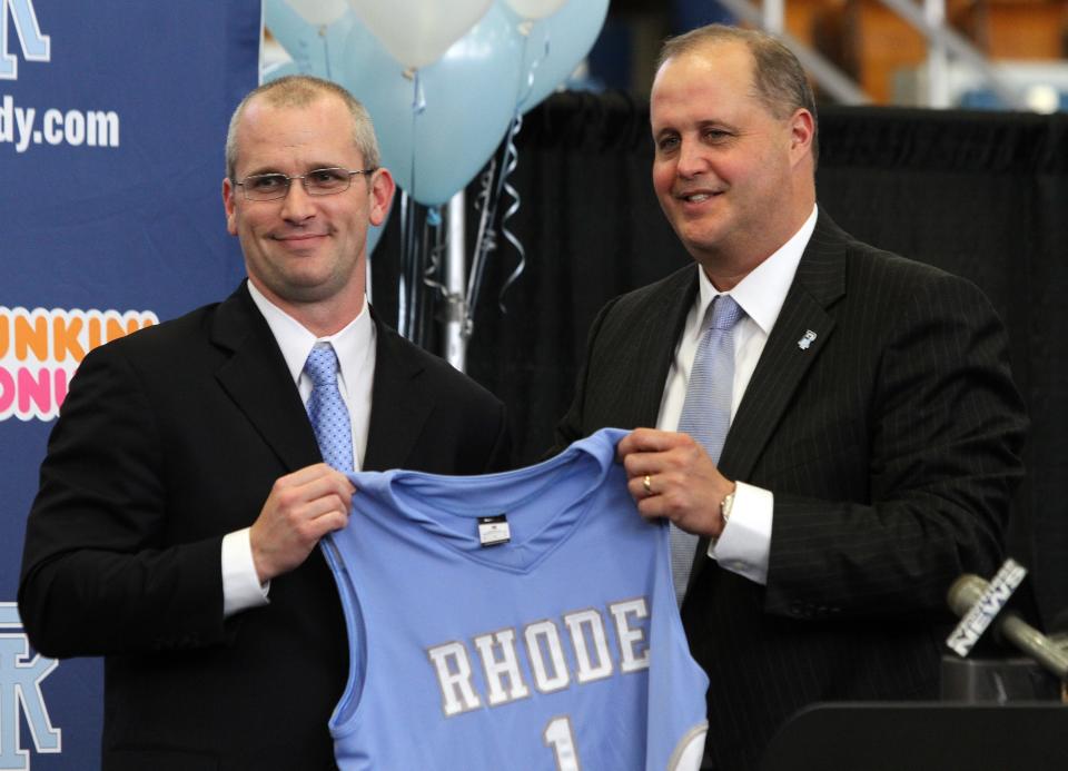 Dan Hurley, left, at his introductory press conference as URI's basketball coach in March 2012 with Athletic Director Thorr Bjorn.