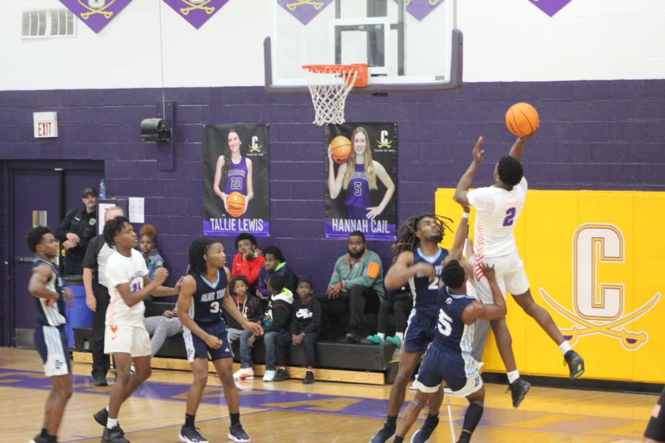 Antonio Baker of Johnson goes up for a shot in the Region 3-3A championship win over Long County Saturday.