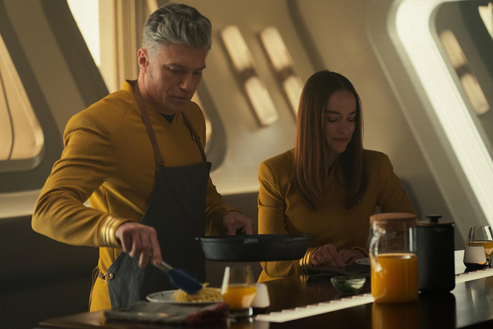 Pike’s cooking skills get a loving depiction in Season One, but he’s repaid for the breakfast he makes for his “friend with benefits” Capt. Batel (Melanie Scrofano) with betrayal. - Credit: Marni Grossman/Paramount+