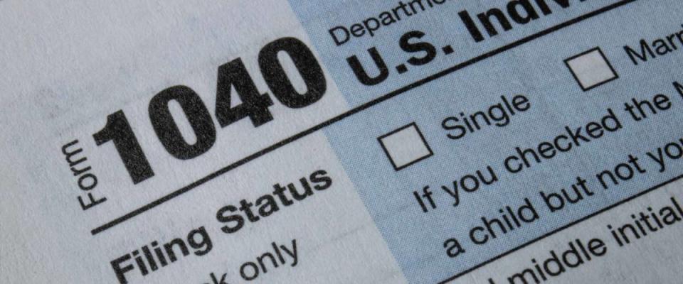 Indianapolis - Circa March 2020: 1040 Tax forms from the IRS. Form 1040 is used by U.S. taxpayers to file an annual income tax return.