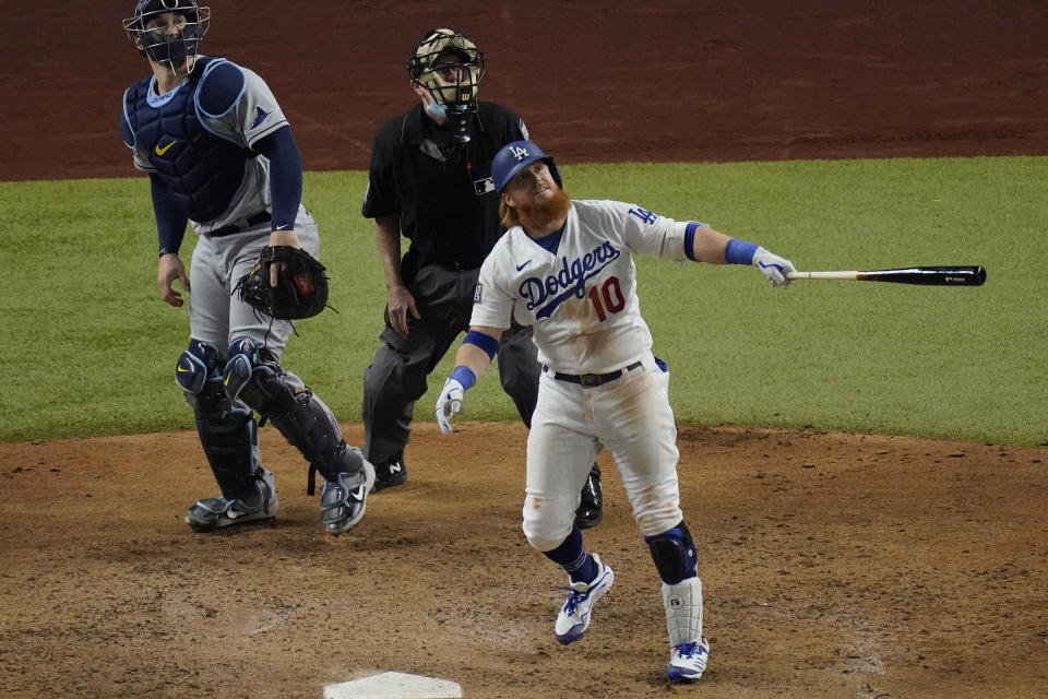 Los Angeles Dodgers' Justin Turner flies out against the Tampa Bay Rays during the sixth inning against the Tampa Bay Rays a baseball World Series Game 6 Tuesday, Oct. 27, 2020, in Arlington, Texas. (AP Photo/Sue Ogrocki)