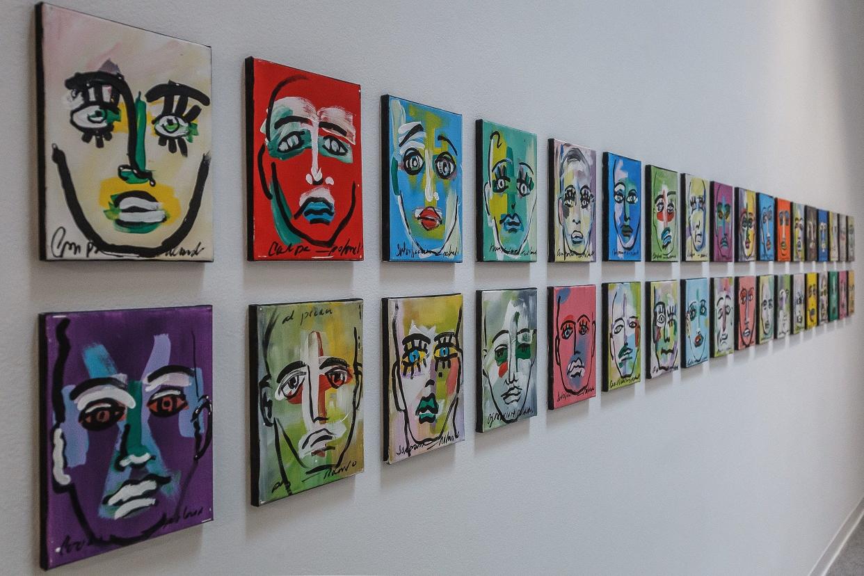 Paintings by artist Rolando Chang Barrero hang in the ÒBeing Heard, Being SeenÓ art exhibit by local artists who identify themselves as LGBTQ+ at the Cultural Council of Palm Beach County in downtown Lake Worth Beach, Fla., on Wednesday, March 16, 2022.