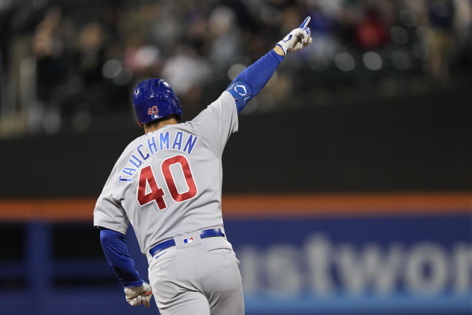 Chicago Cubs' Mike Tauchman runs the bases after hitting a solo home run off New York Mets relief pitcher Drew Smith in the eighth inning of a baseball game, Tuesday, Aug. 8, 2023, in New York. (AP Photo/John Minchillo)