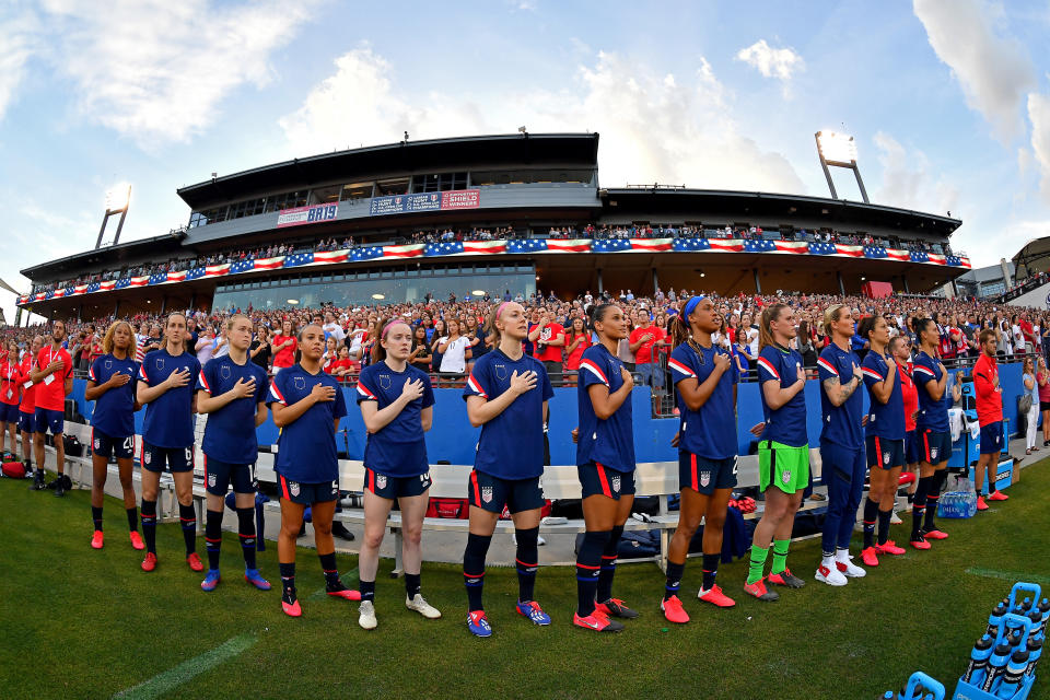 FRISCO, TEXAS - MARCH 11: The United States women's soccer team sing the national anthem before the SheBelieves Cup match against the Japan at Toyota Stadium on March 11, 2020 in Frisco, Texas. The United States topped Japan, 3-1. (Photo by Alika Jenner/Getty Images)