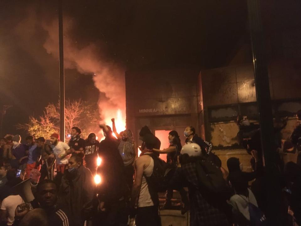 <div class="inline-image__caption"><p>Protesters overran Minneapolis’ 3rd Precinct headquarters and set it on fire.</p></div> <div class="inline-image__credit">Solomon Gustavo</div>