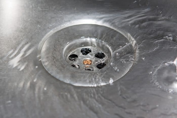 water going down sink drain