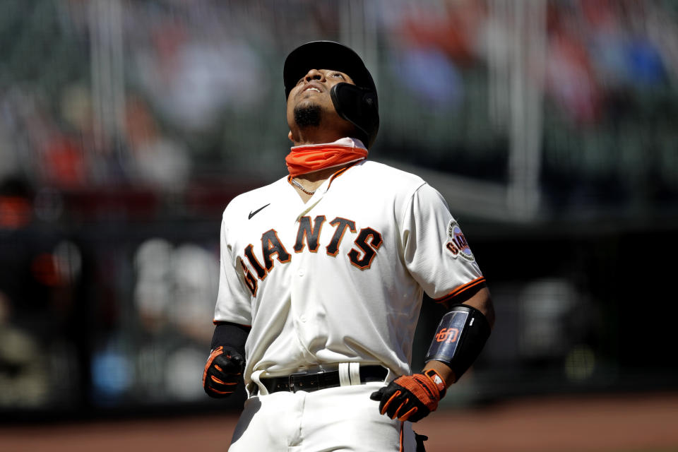 San Francisco Giants' Chadwick Tromp celebrates as he crosses home plate after hitting a two run home run against the Texas Rangers in the sixth inning of a baseball game Sunday, Aug. 2, 2020, in San Francisco. (AP Photo/Ben Margot)