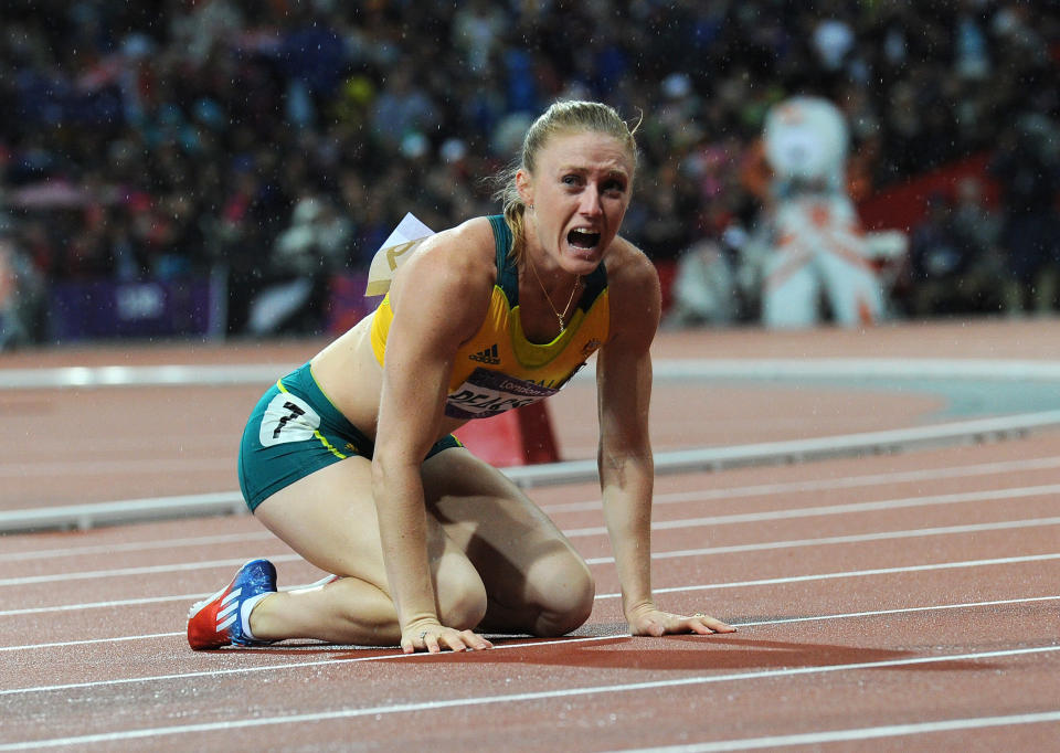 Australia's Sally Pearson reacts after winning the Final of the Women's 100m Hurdles at the Olympic Games in London, Tuesday, Aug. 7, 2012. (AAP Image/Dave Hunt) NO ARCHIVING