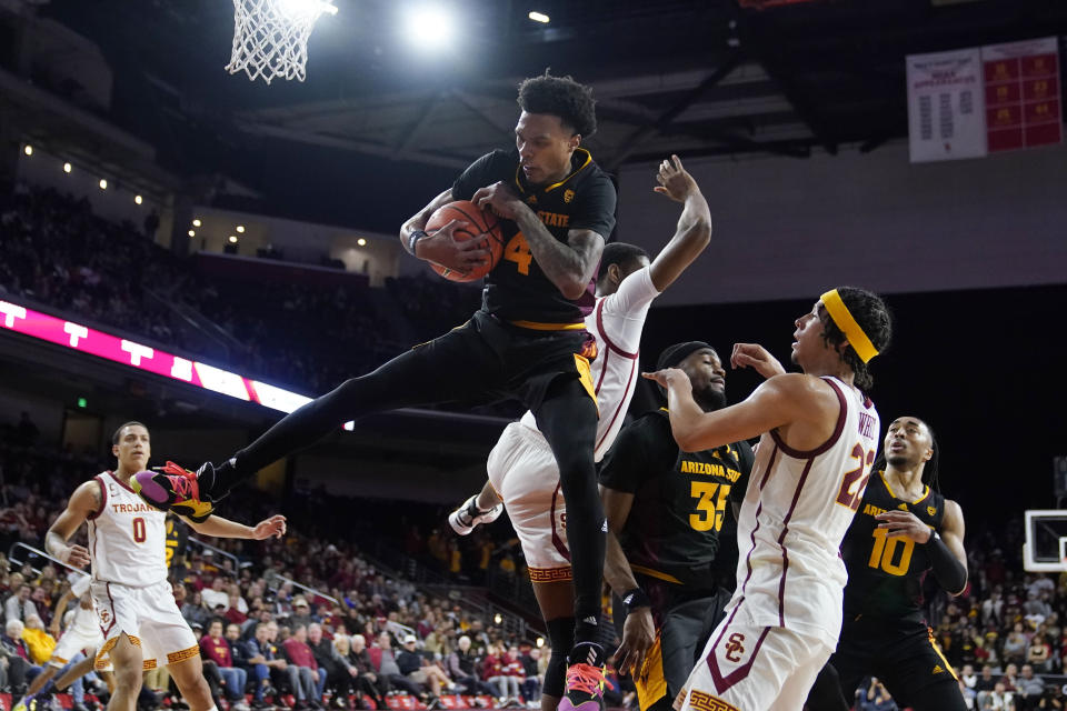 Arizona State guard Desmond Cambridge Jr. (4) grabs a rebound against Southern California during the second half of an NCAA college basketball game Saturday, March 4, 2023, in Los Angeles. (AP Photo/Marcio Jose Sanchez)