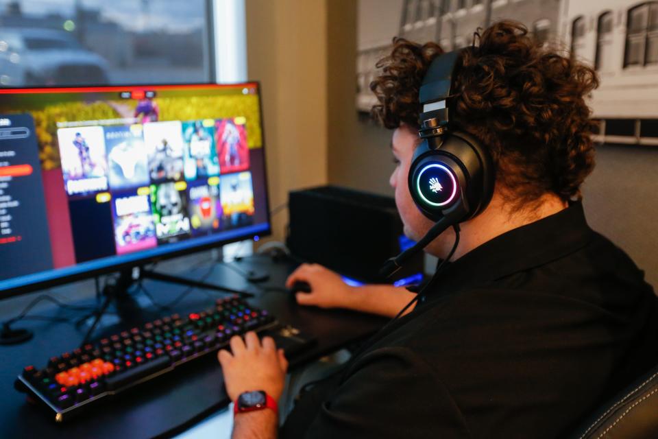 Tucker Haynes utilizes one of the five Contender Esports gaming setups at Vib Best Western Springfield on Thursday, Dec. 15, 2022. The setups were unveiling during the launch of the Springfield Esports Coalition.
