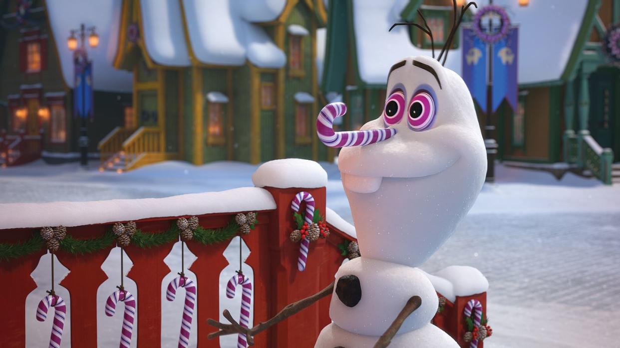 a scene from olaf's frozen adventure, a good housekeeping pick for best christmas movies for kids