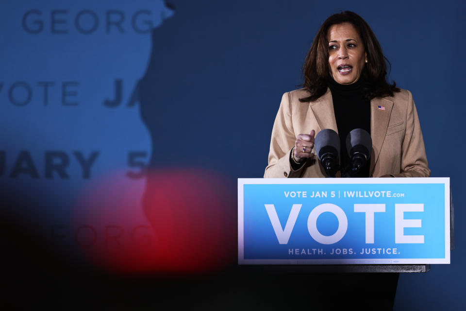 SAVANNAH, GEORGIA - JANUARY 03: Vice President-elect Kamala Harris speaks during a drive-in rally at Garden City Stadium on January 03, 2021 in Savannah, Georgia. Vice President-elect Kamala Harris joined Georgia Democratic Senate candidates Rev. Raphael Warnock and Jon Ossoff for a campaign event two days before the January 5th runoff election that has implications into which party controls the U.S. Senate. According to AJC, 3 million people have already casted their votes ahead of Tuesday's election.  (Photo by Michael M. Santiago/Getty Images)