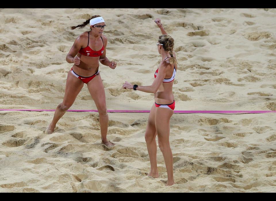 Misty May-Treanor and Kerri Walsh Jennings of the United States celebrate a point during the Women's Beach Volleyball Gold medal match against the United States on Day 12 of the London 2012 Olympic Games at the Horse Guard's Parade on August 8, 2012 in London, England. 