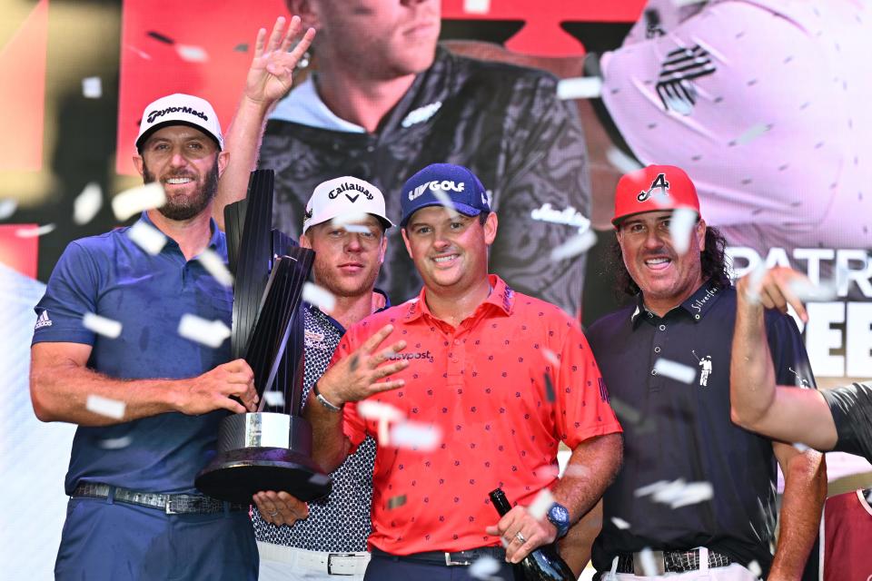 From left, Dustin Johnson, Talor Gooch, Patrick Reed and Pat Perez celebrate their team victory after the final round of the Chicago LIV Golf tournament on Sept. 18.