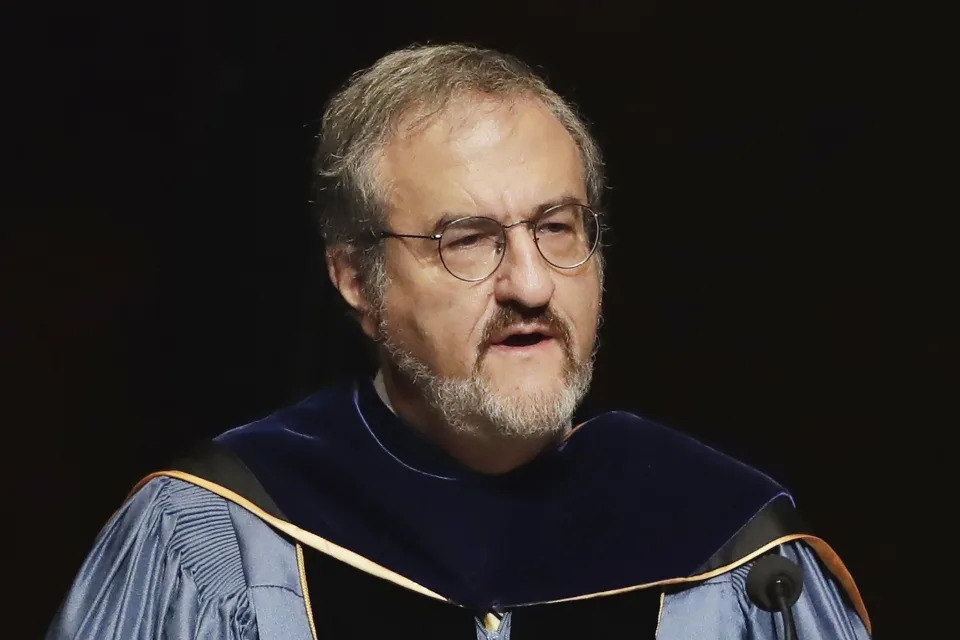 In this Jan. 30 2017, file photo, University of Michigan President Mark Schlissel speaks during a ceremony at the university, in Ann Arbor, Mich. Schlissel has been removed as president of the University of Michigan due to the alleged