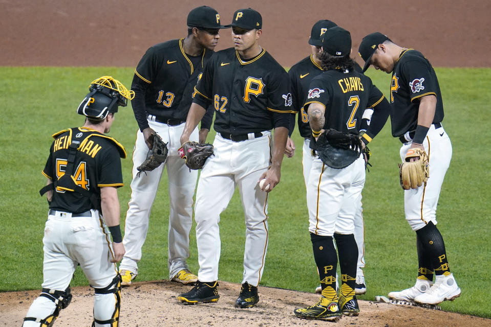 Pittsburgh Pirates starting pitcher Jose Quintana (62) waits for manager Derek Shelton to remove him from a baseball game against the Detroit Tigers during the fourth inning in Pittsburgh, Tuesday, June 7, 2022. (AP Photo/Gene J. Puskar)