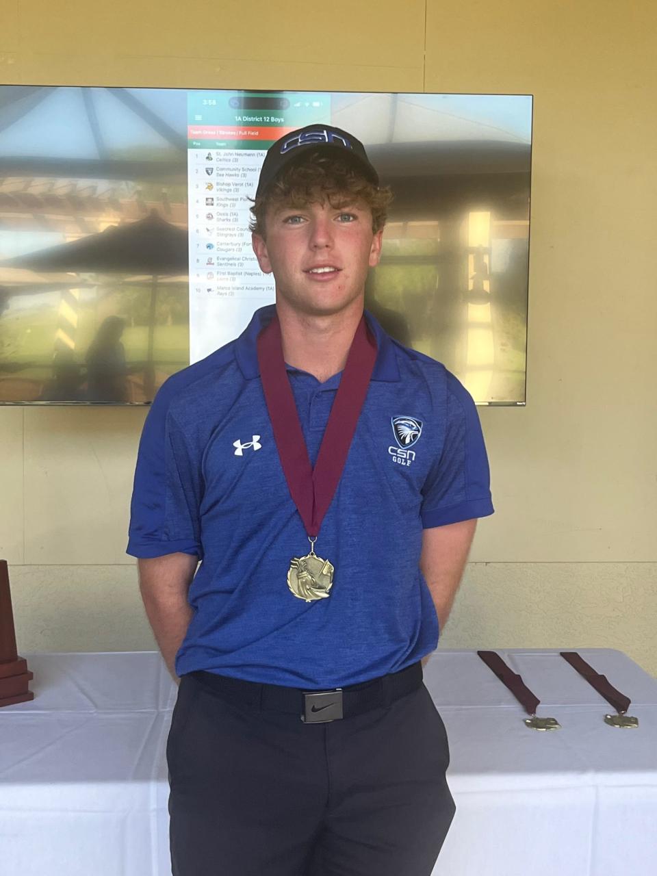 Spencer Ives after finishing in first place individually in the Class 1A-District 12 boys golf championship.