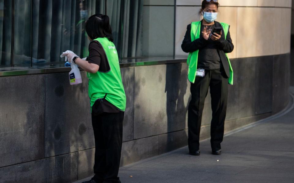 Staff sanitize the premises outside the Star Casino in Sydney. According to local media reports, a man who visited the casino has tested positive to COVID-19 while 13 people are now linked to a cluster at a Sydney pub - JAMES GOURLEY/EPA-EFE/Shutterstock/Shutterstock
