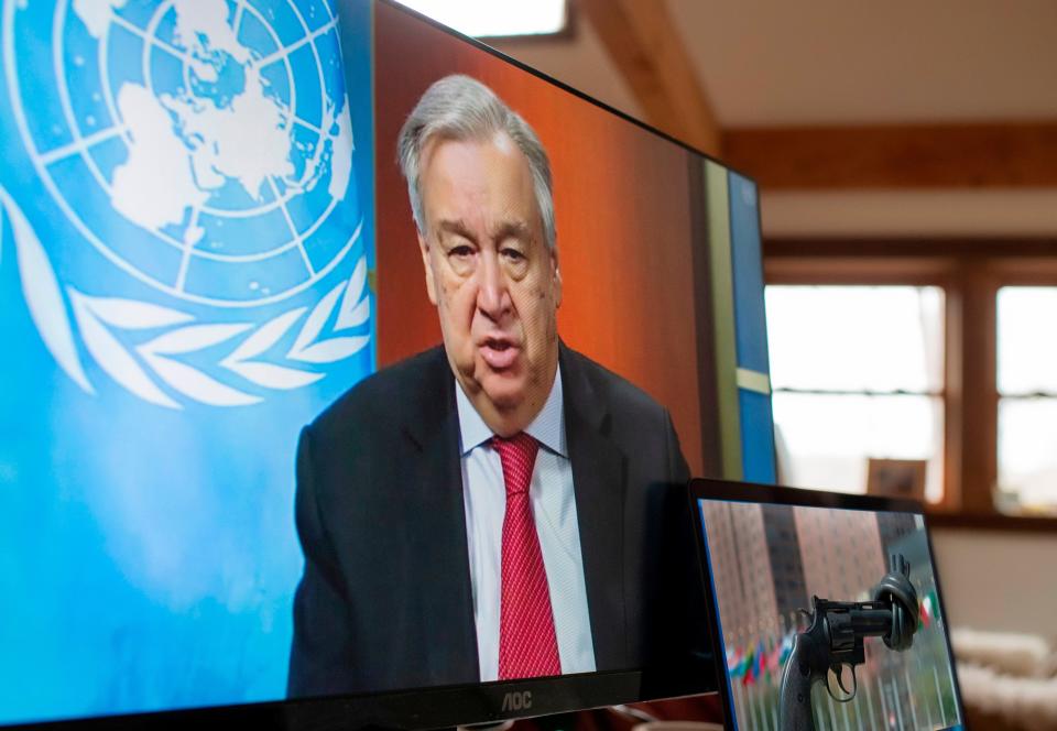 In this handout image released by the United Nations, U.N. Secretary-General Antonio Guterres holds a virtual press conference on April 3, 2020, at UN headquarters in New York. Guterres Friday renewed his call for a global cease-fire, urging all parties to conflict to lay down arms and allow war-torn nations to combat the coronavirus pandemic. "The worst is yet to come," Guterres said, referring to countries beset with fighting like Syria, Libya and Yemen. "The COVID-19 storm is now coming to all these theatres of conflict."