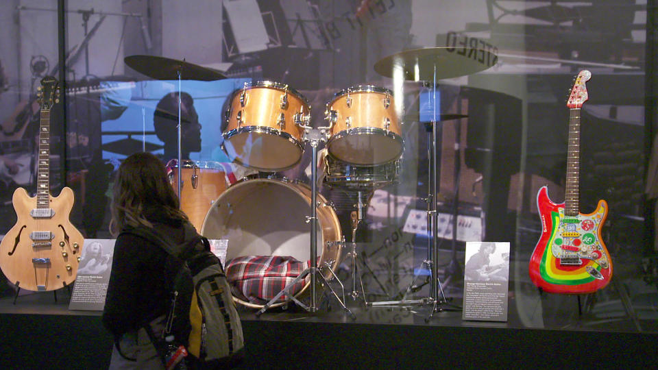 An exhibit of Beatles artifacts at the Rock & Roll Hall of Fame in Cleveland.  / Credit: CBS News