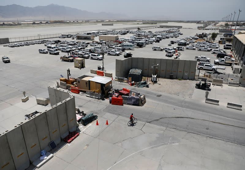 FILE PHOTO: Parked vehicles are seen in Bagram U.S. air base, after American troops vacated it, in Parwan province