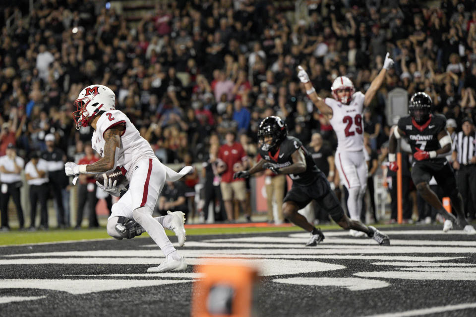 Miami (Ohio) defensive back Yahsyn McKee (2) makes an interception in the end zone during overtime in an NCAA college football game against Cincinnati, Saturday, Sept. 16, 2023, in Cincinnati. (AP Photo/Jeff Dean)