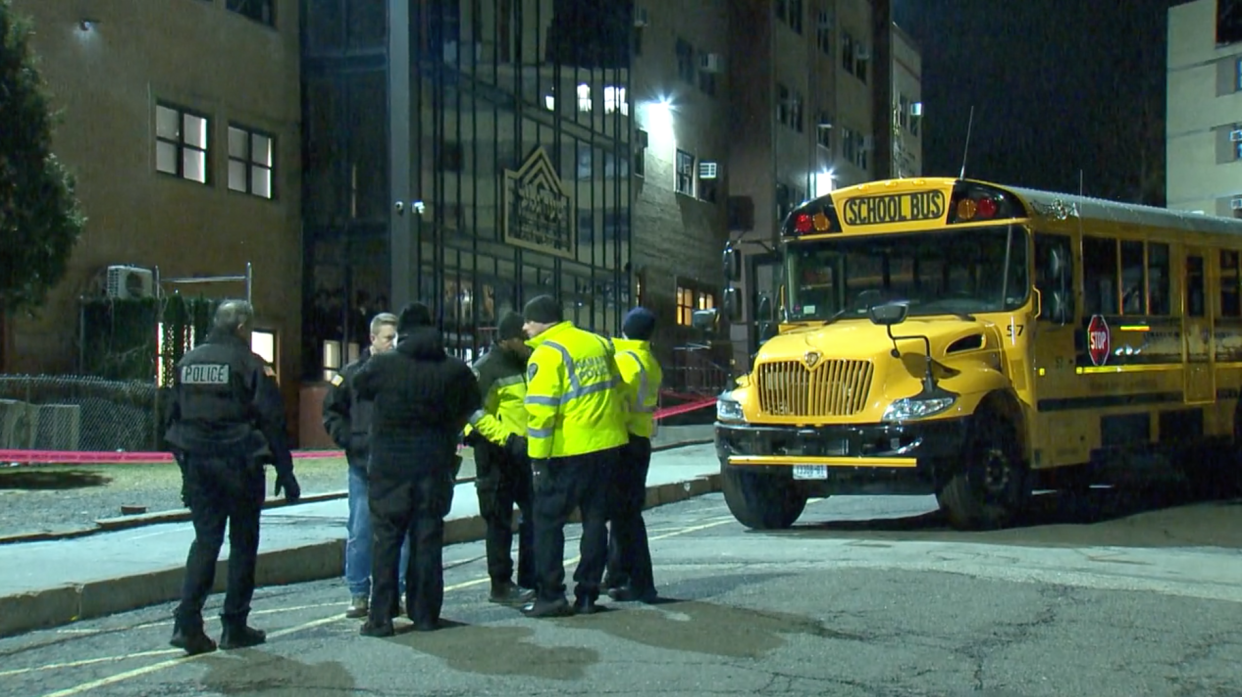 This still from video shows police at the scene where a child was struck by a school bus Monday, Jan. 29, 2024, in New Square, NY.