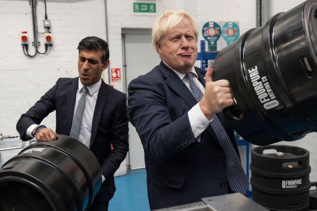 Boris Johnson and Rishi Sunak in October last year. (Photo: DAN KITWOOD via Getty Images)