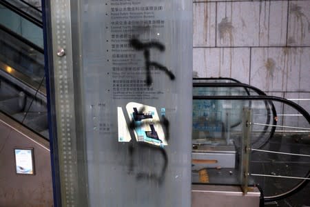 Graffiti demanding the authorities to step down, is seen at Hong Kong Police headquarters in Hong Kong, China