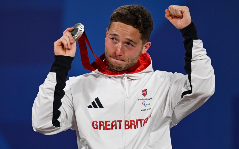 Silver medalist Alfie Hewett of Great Britain on the podium of the men's Wheelchair Tennis Singles, Paris 2024 Summer Paralympic Games, Roland Garros, September 7, 2024