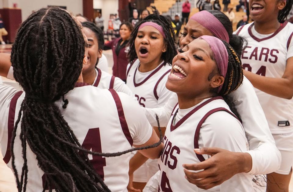 Lawrence Central Bears guard Laila Abdurraqib (44) yells in excitement Thursday, Dec. 7, 2023, after the game at Lawrence Central High School in Indianapolis. The Lawrence Central Bears defeated the Lawrence North Wildcats, 57-55.