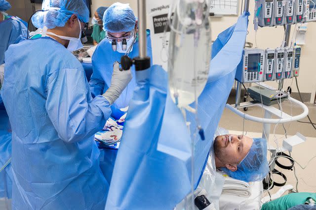 <p>Jose M. Osorio/Northwestern Medicine</p> John Nicholas undergoes a kidney transplant while awake at Northwestern Medicine.